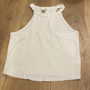 a white cropped tank